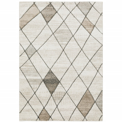 5' X 8' Beige Grey Tan And Brown Geometric Power Loom Stain Resistant Area Rug