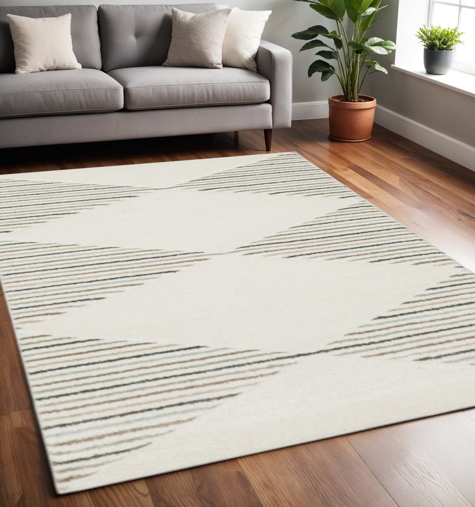 5' X 8' Beige Grey Sage Green Pale Blue Brown And Charcoal Geometric Power Loom Stain Resistant Area Rug