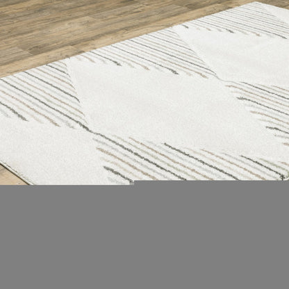 6' X 9' Beige Grey Sage Green Pale Blue Brown And Charcoal Geometric Power Loom Stain Resistant Area Rug