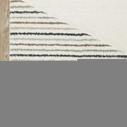 6' X 9' Beige Grey Sage Green Pale Blue Brown And Charcoal Geometric Power Loom Stain Resistant Area Rug