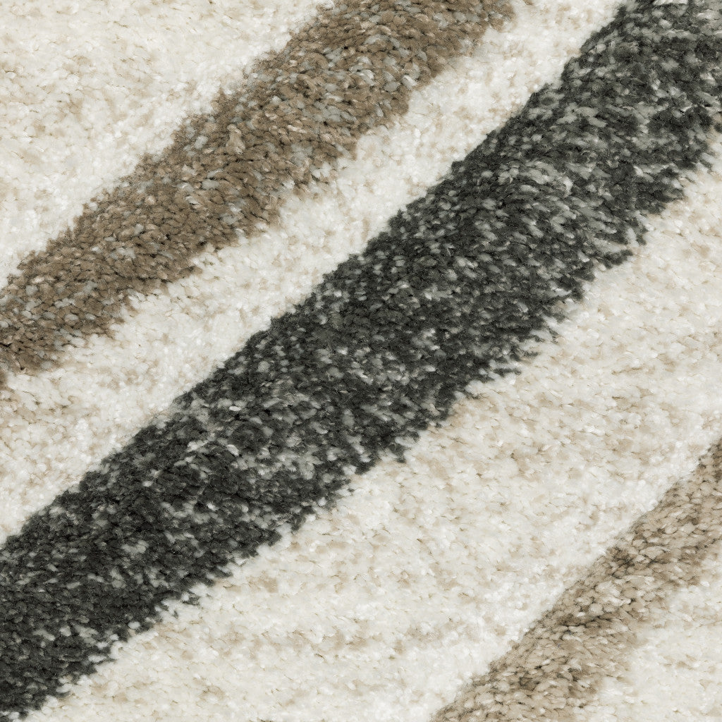 3' X 5' Beige Grey Brown Sage Pale Blue Tan And Charcoal Abstract Power Loom Stain Resistant Area Rug