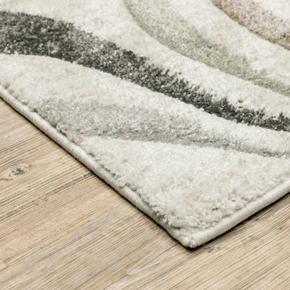 5' X 8' Beige Grey Brown Sage Pale Blue Tan And Charcoal Abstract Power Loom Stain Resistant Area Rug