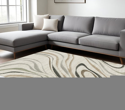6' X 9' Beige Grey Brown Sage Pale Blue Tan And Charcoal Abstract Power Loom Stain Resistant Area Rug