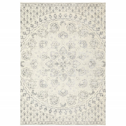 4' X 6' Ivory And Grey Floral Power Loom Stain Resistant Area Rug