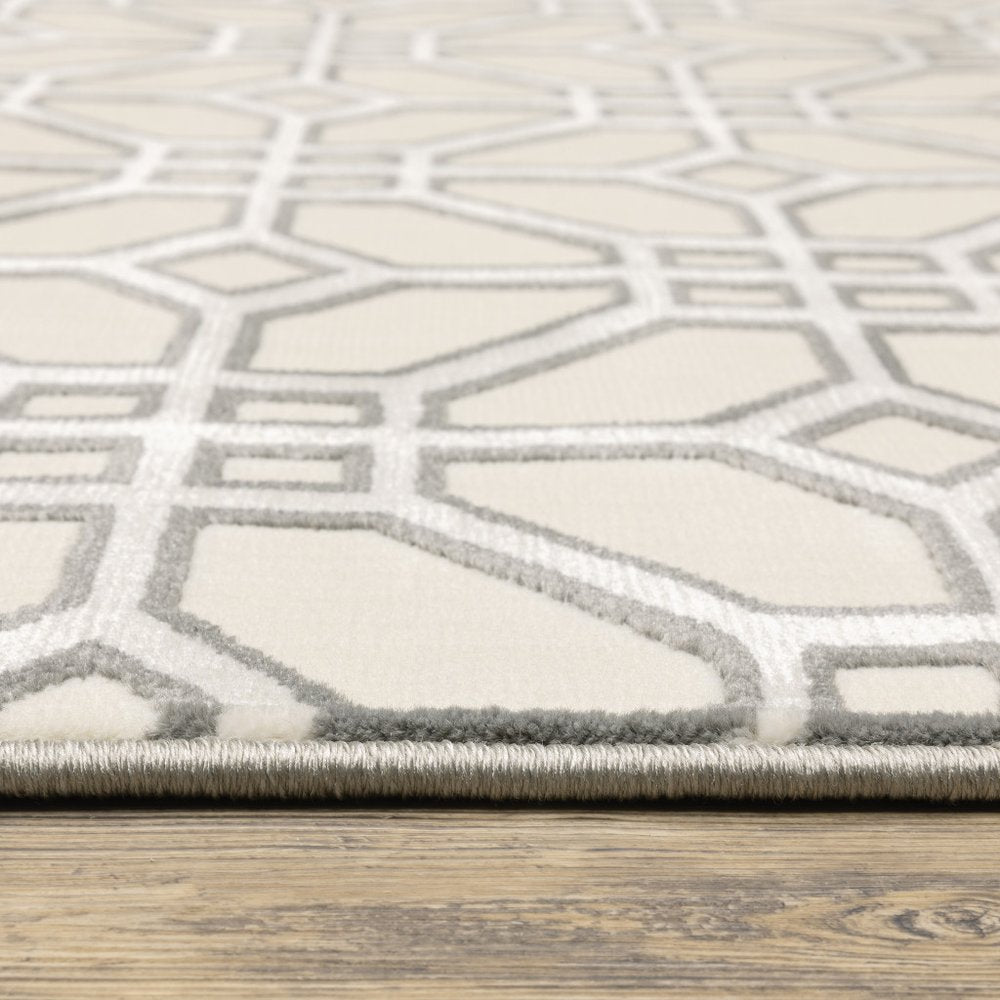 10' X 13' Ivory And Grey Geometric Power Loom Stain Resistant Area Rug