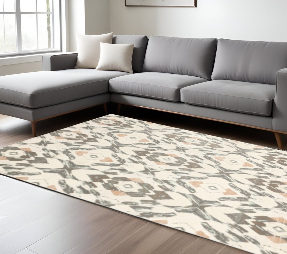 10' X 13' Ivory Pink And Sage Geometric Power Loom Stain Resistant Area Rug