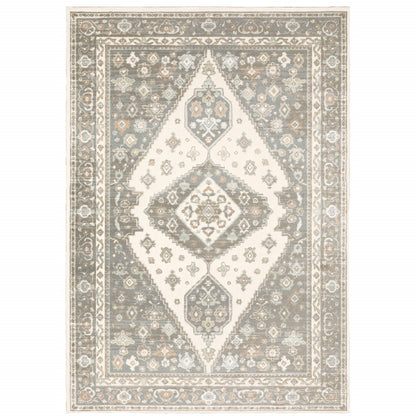 5' X 8' Grey Pink And Brown Oriental Power Loom Stain Resistant Area Rug