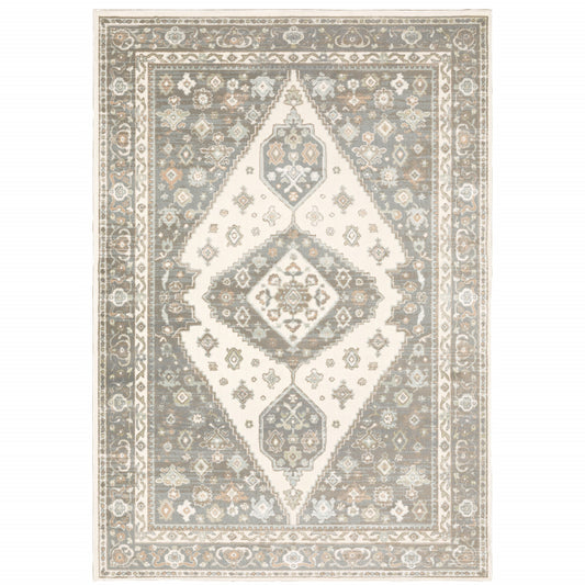 5' X 8' Grey Pink And Brown Oriental Power Loom Stain Resistant Area Rug