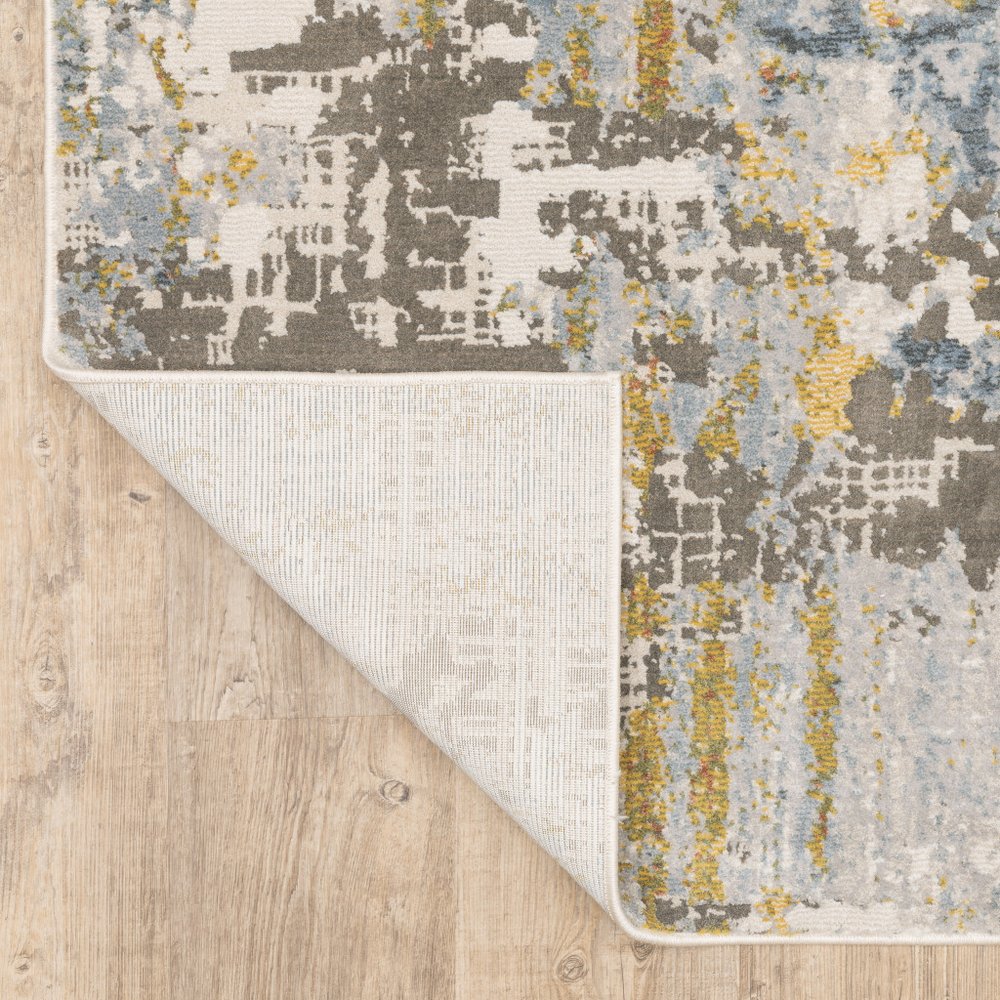 8' X 11' Beige And Blue Abstract Area Rug