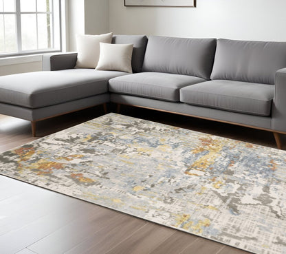 10' X 13' Grey Blue Beige Gold And Rust Abstract Power Loom Stain Resistant Area Rug