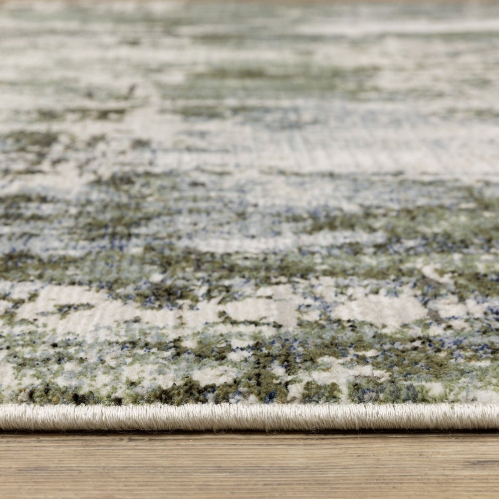 7' X 10' Green And Blue Abstract Area Rug