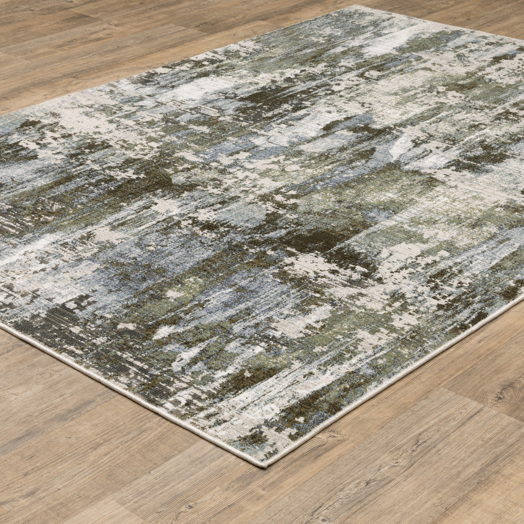 6' X 9' Green Blue Grey Ivory And Brown Abstract Power Loom Stain Resistant Area Rug