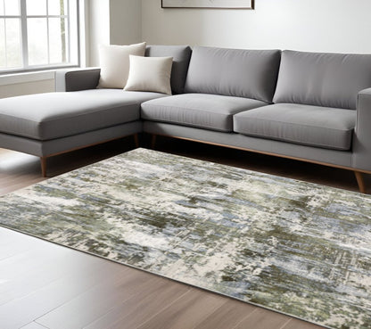 10' X 13' Green Blue Grey Ivory And Brown Abstract Power Loom Stain Resistant Area Rug