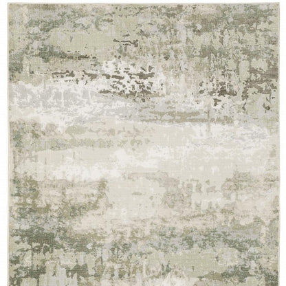3' X 5' Beige Grey Brown And Sage Green Abstract Power Loom Stain Resistant Area Rug