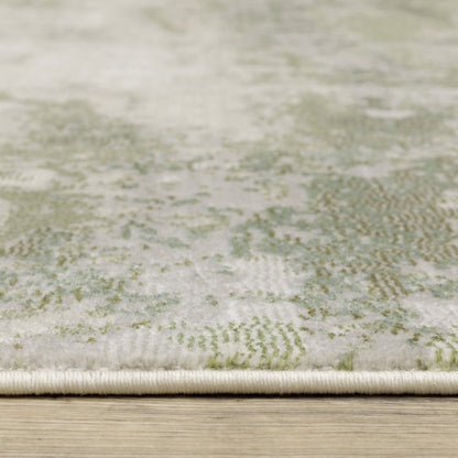 5' X 8' Beige And Green Abstract Distressed Area Rug