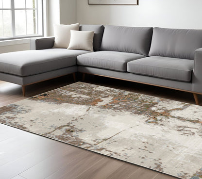 7' X 10' Beige And Pink Abstract Distressed Area Rug