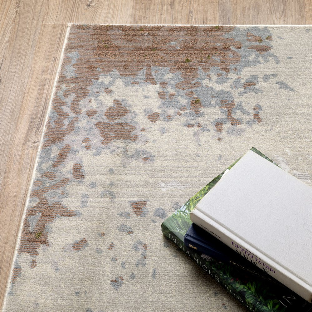 8' X 11' Beige And Pink Abstract Distressed Area Rug