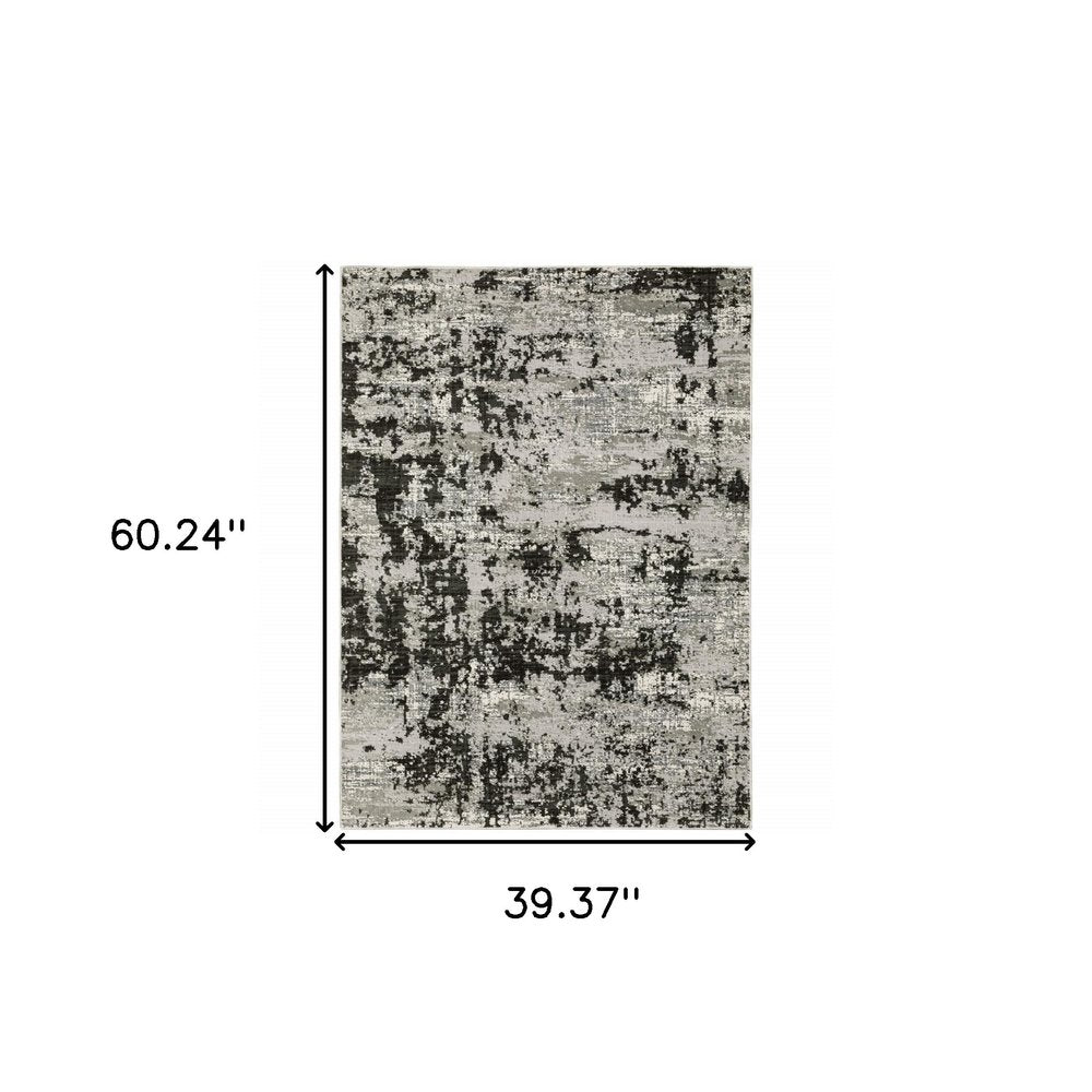 3' X 5' Grey Charcoal Black And Ivory Abstract Power Loom Stain Resistant Area Rug