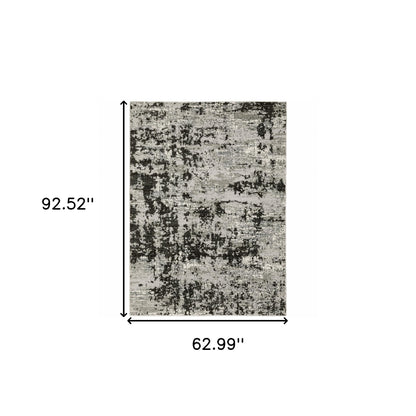 5' X 8' Grey Charcoal Black And Ivory Abstract Power Loom Stain Resistant Area Rug