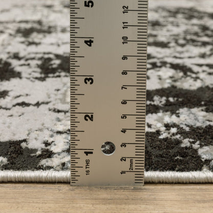 7' X 10' Gray And Black Abstract Distressed Area Rug