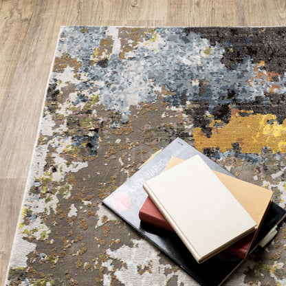 7' X 10' Beige Green And Orange Abstract Area Rug