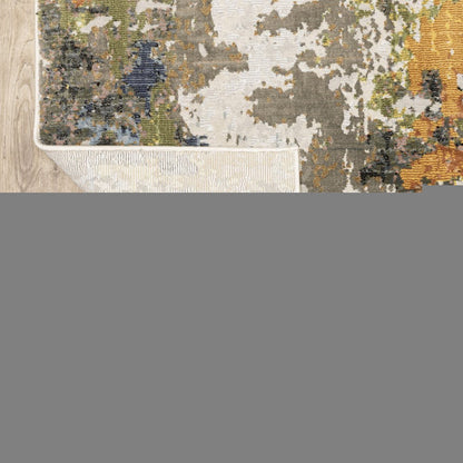7' X 10' Beige Green And Orange Abstract Area Rug