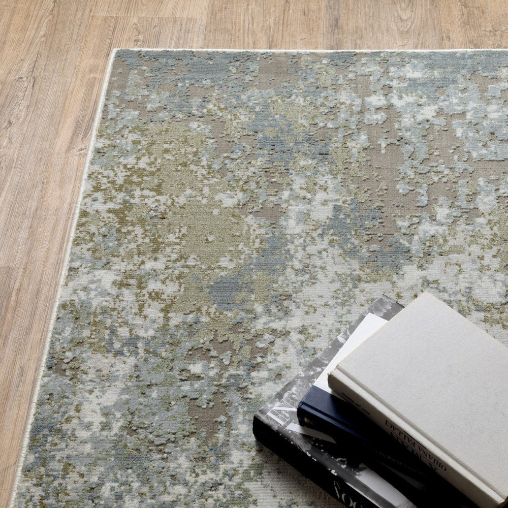 8' X 11' Blue Grey Green And Beige Abstract Power Loom Stain Resistant Area Rug