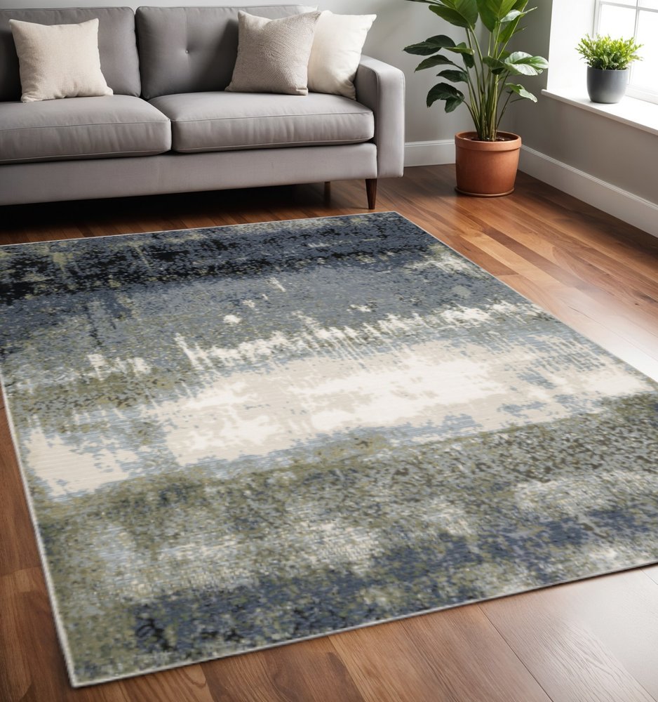 5' X 8' Blue Green Grey And Beige Abstract Power Loom Stain Resistant Area Rug