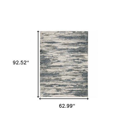 5' X 8' Blue Grey Beige And Brown Abstract Power Loom Stain Resistant Area Rug