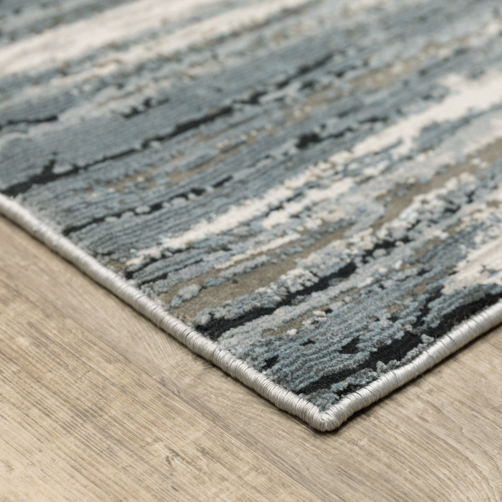 8' X 11' Blue Grey Beige And Brown Abstract Power Loom Stain Resistant Area Rug