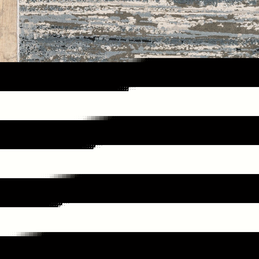 8' X 11' Blue Grey Beige And Brown Abstract Power Loom Stain Resistant Area Rug