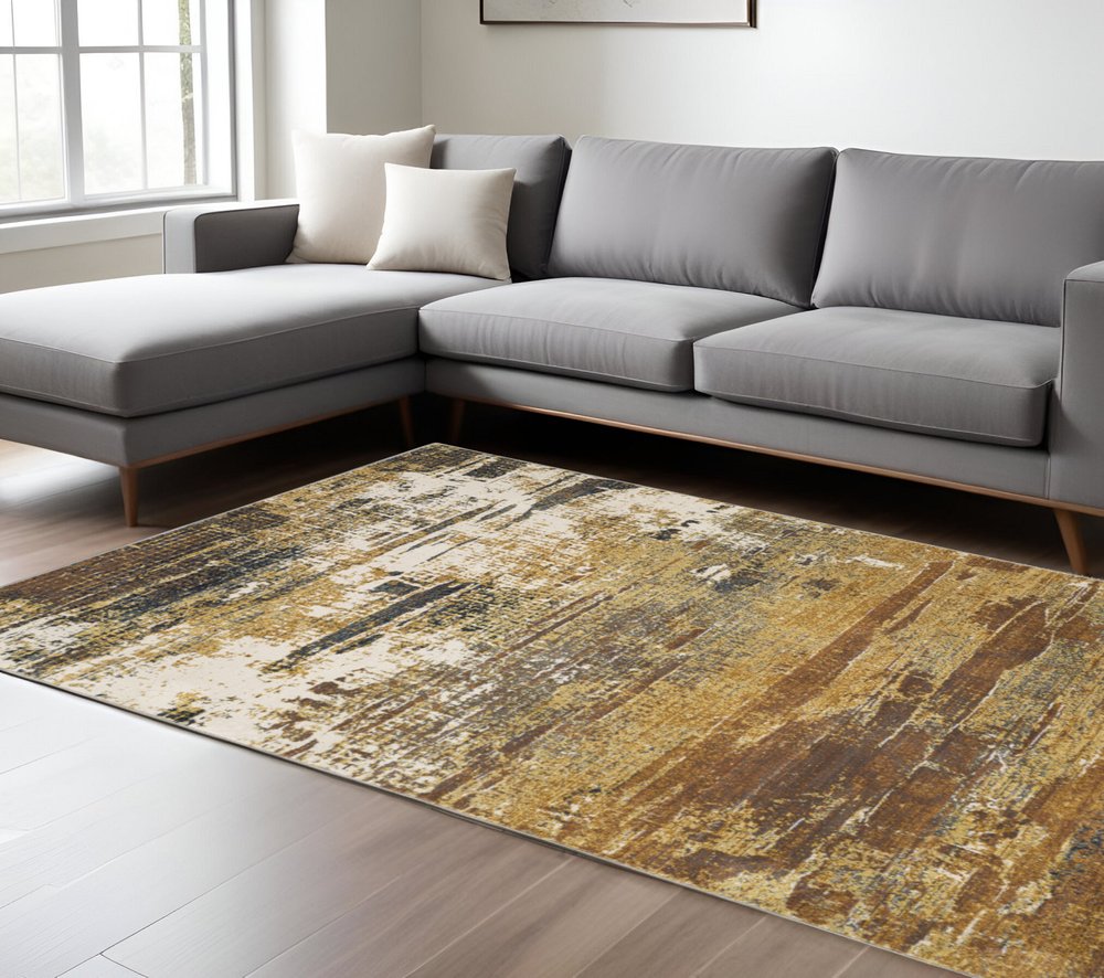 7' X 10' Gold And Beige Abstract Area Rug