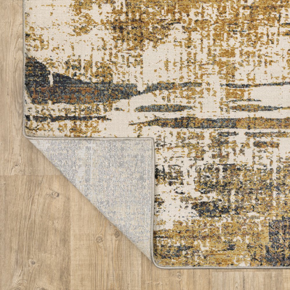 7' X 10' Gold And Beige Abstract Area Rug