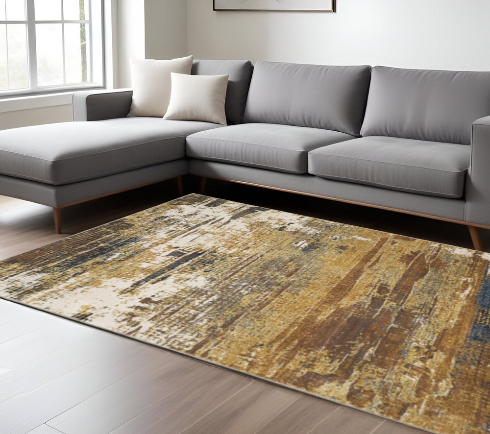 10' X 13' Gold Brown Rust Grey Blue And Beige Abstract Power Loom Stain Resistant Area Rug
