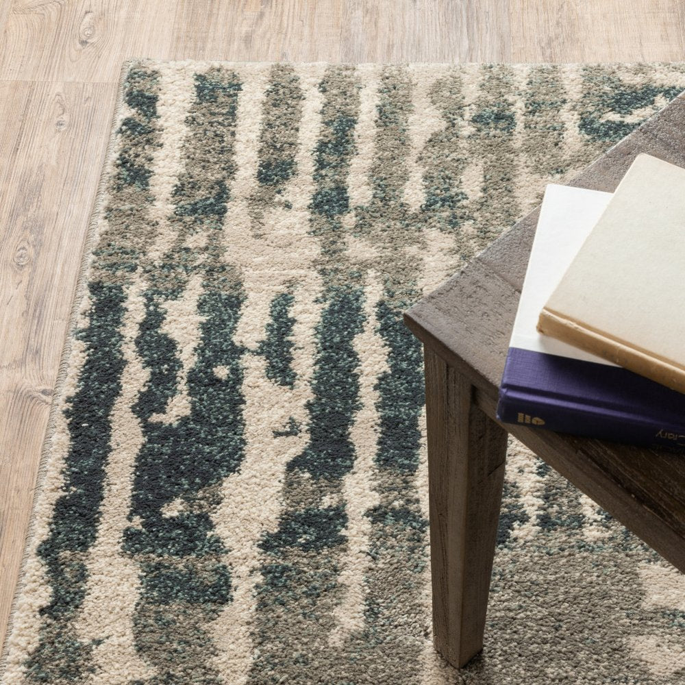 4' X 6' Blue And Beige Abstract Power Loom Stain Resistant Area Rug