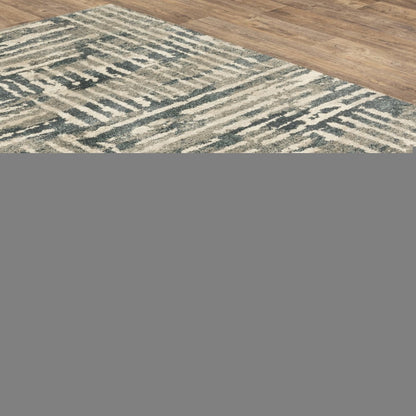 5' X 7' Blue And Beige Abstract Power Loom Stain Resistant Area Rug