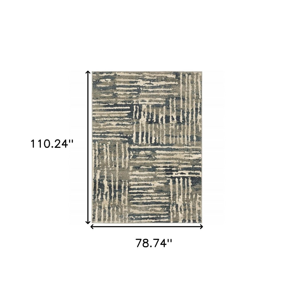 7' X 9' Blue And Beige Abstract Shag Area Rug
