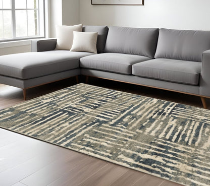 10' X 13' Blue And Beige Abstract Power Loom Stain Resistant Area Rug