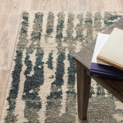 10' X 13' Blue And Beige Abstract Power Loom Stain Resistant Area Rug