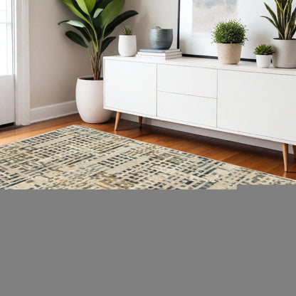 4' X 6' Beige Grey Blues Orange Yellow And Ivory Abstract Power Loom Stain Resistant Area Rug
