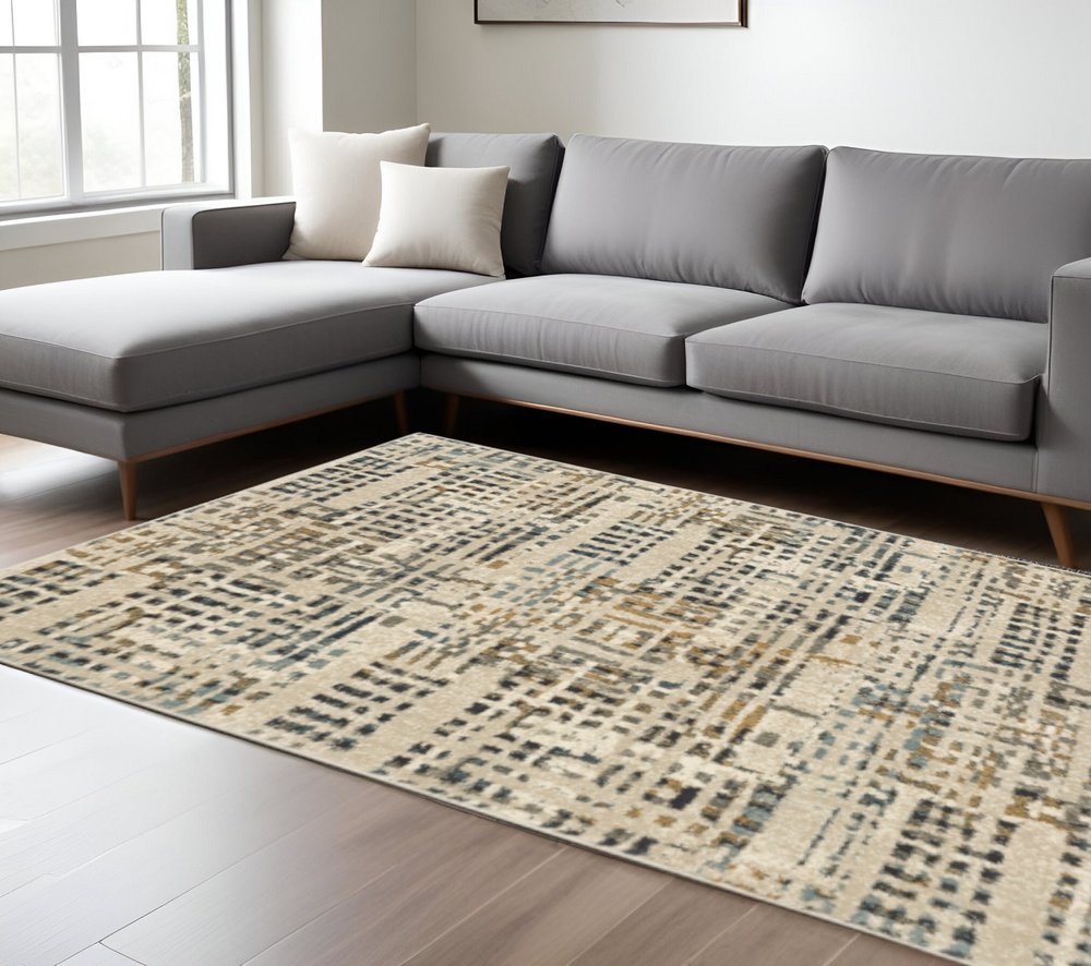 8' X 10' Beige Grey Blues Orange Yellow And Ivory Abstract Power Loom Stain Resistant Area Rug