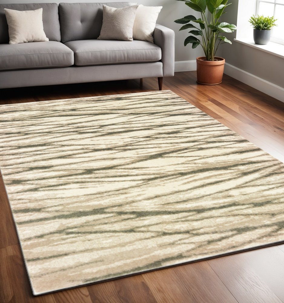 5' X 7' Ivory Sand And Ash Abstract Power Loom Stain Resistant Area Rug