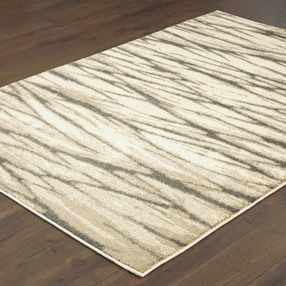 7' X 9' Ivory And Sand Abstract Shag Area Rug