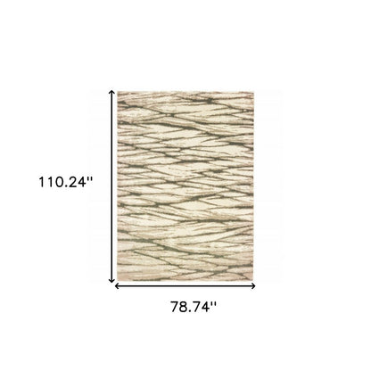 7' X 9' Ivory And Sand Abstract Shag Area Rug