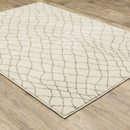 5' X 7' Ivory And Grey Geometric Power Loom Stain Resistant Area Rug