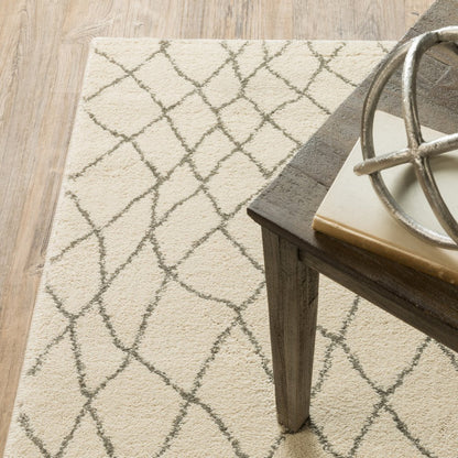 7' X 9' Gray And Ivory Geometric Shag Area Rug