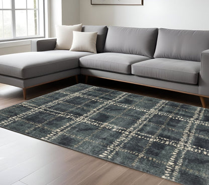7' X 9' Blue And Ivory Geometric Shag Area Rug