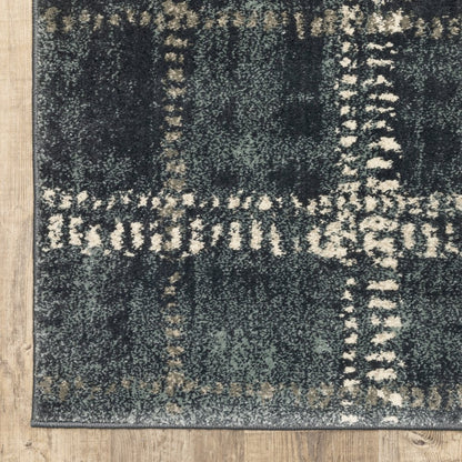 7' X 9' Blue And Ivory Geometric Shag Area Rug