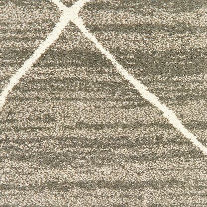 7' X 9' Gray And Ivory Geometric Shag Area Rug