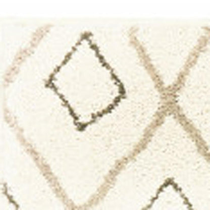 7' X 9' Gray And Ivory Geometric Shag Area Rug